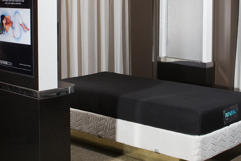 customer laying on the Zeez machine for testing